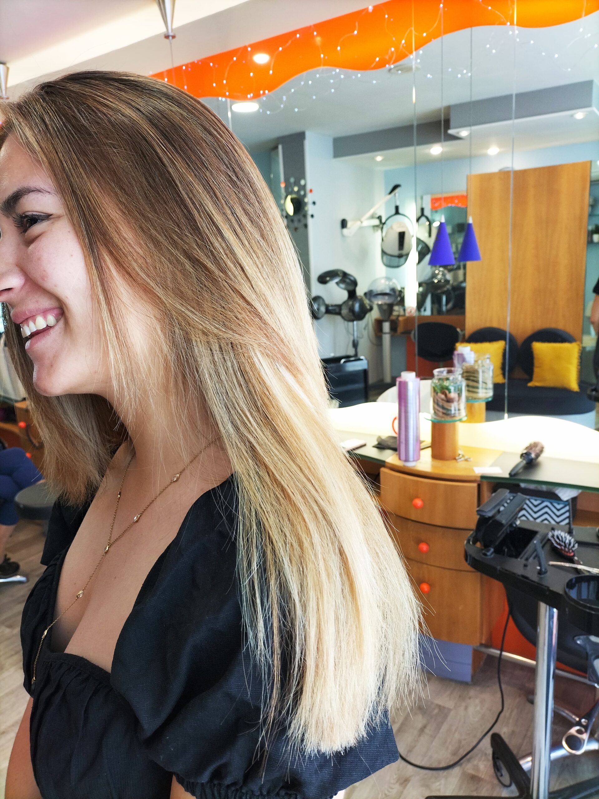 Ombré hair blond doré et caramel sur cheveux longs et épais à Bordeaux